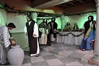 Escena 12: La transformación del agua en vino en las Bodas de Caná