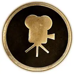 Una cámara cinematográfica, por su contribución a la industria del cine.