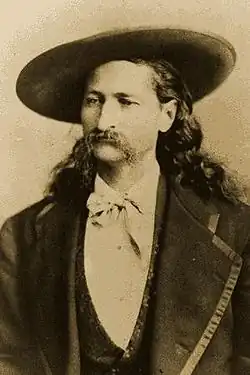 Wild Bill con sombrero y levita
